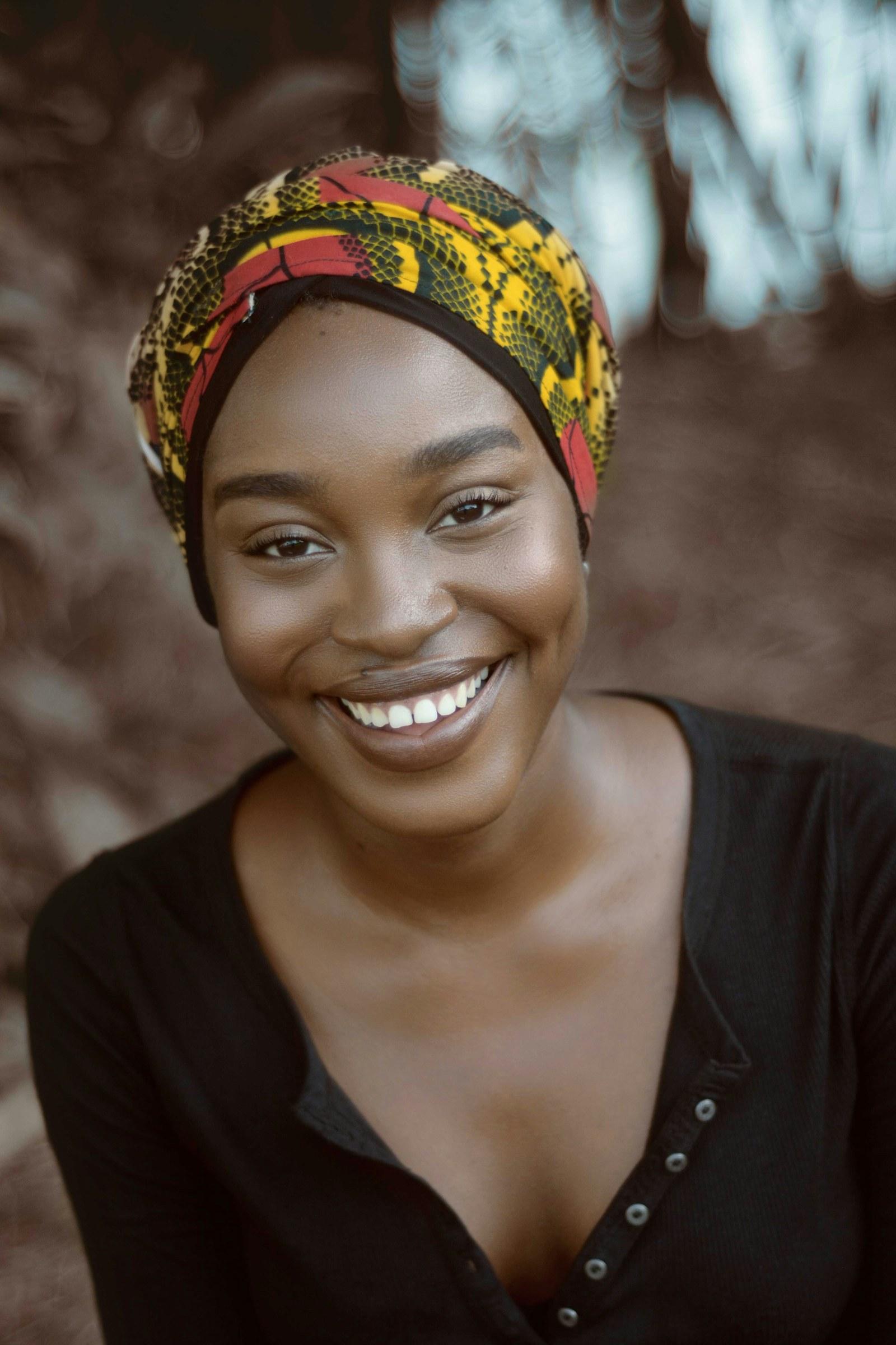 Portrait of a smiling woman in warm natural light